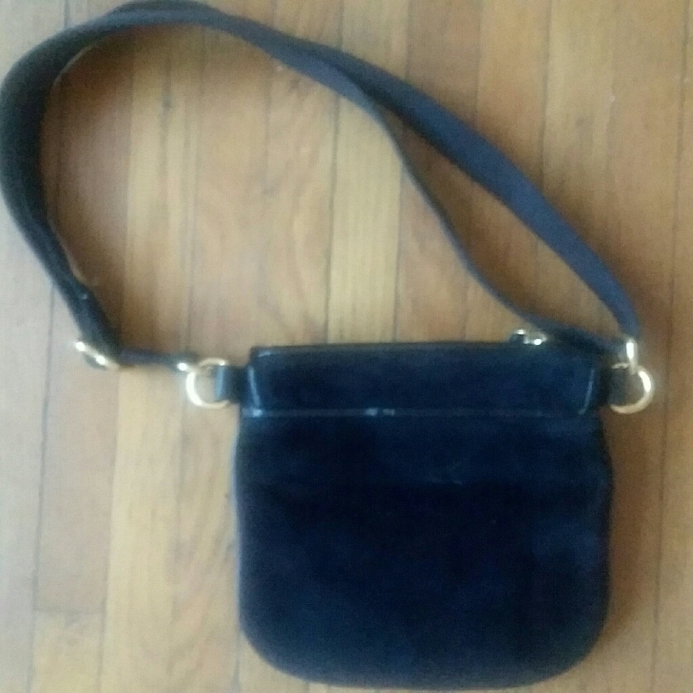 Juicy Couture Black satchel!!!!!!! Poka-Dot Interior soft material
ITEM #1 - Picture 14 of 16